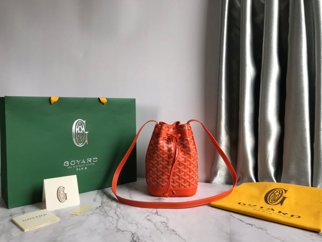 PETIT FLOT BUCKET BAG 22 IN ORANGE GOYARDINE CANVAS AND LAMBSKIN TRIM