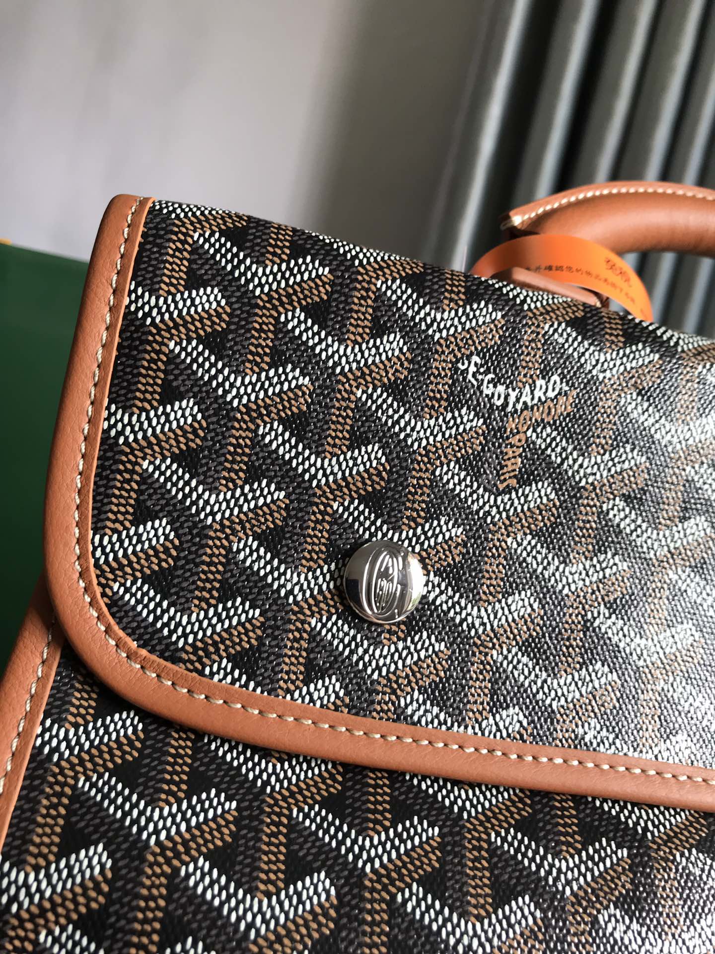 SAINT LÉGER BACKPACK 35 IN BROWN GOYARDINE CANVAS AND CALFSKIN WITH CARTOON PATCH