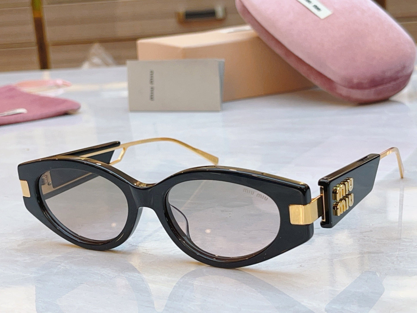 Miumiu Sunglasses 692554