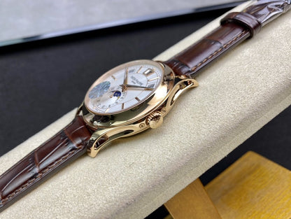 PATEK ANNUAL CALENDAR YELLOW GOLD WHITE DIAL