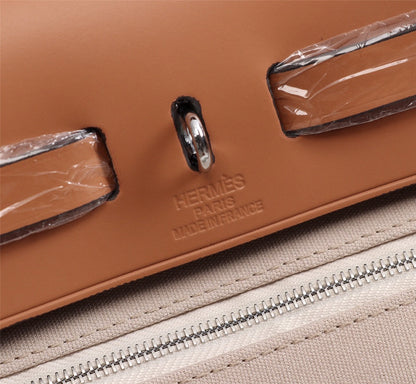 HM HERBAG ZIP 31 APRICOT AND COPPER CANVAS