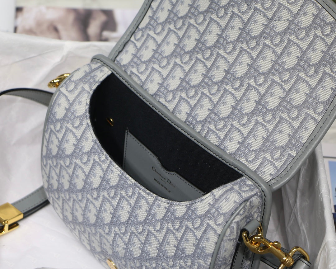 MEDIUM CD BOBBY 22CM GREY OBLIQUE CANVAS GOLD HARDWARE