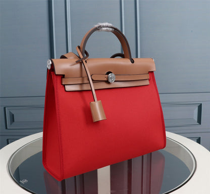HM HERBAG ZIP 31 RED AND CIDER CANVAS