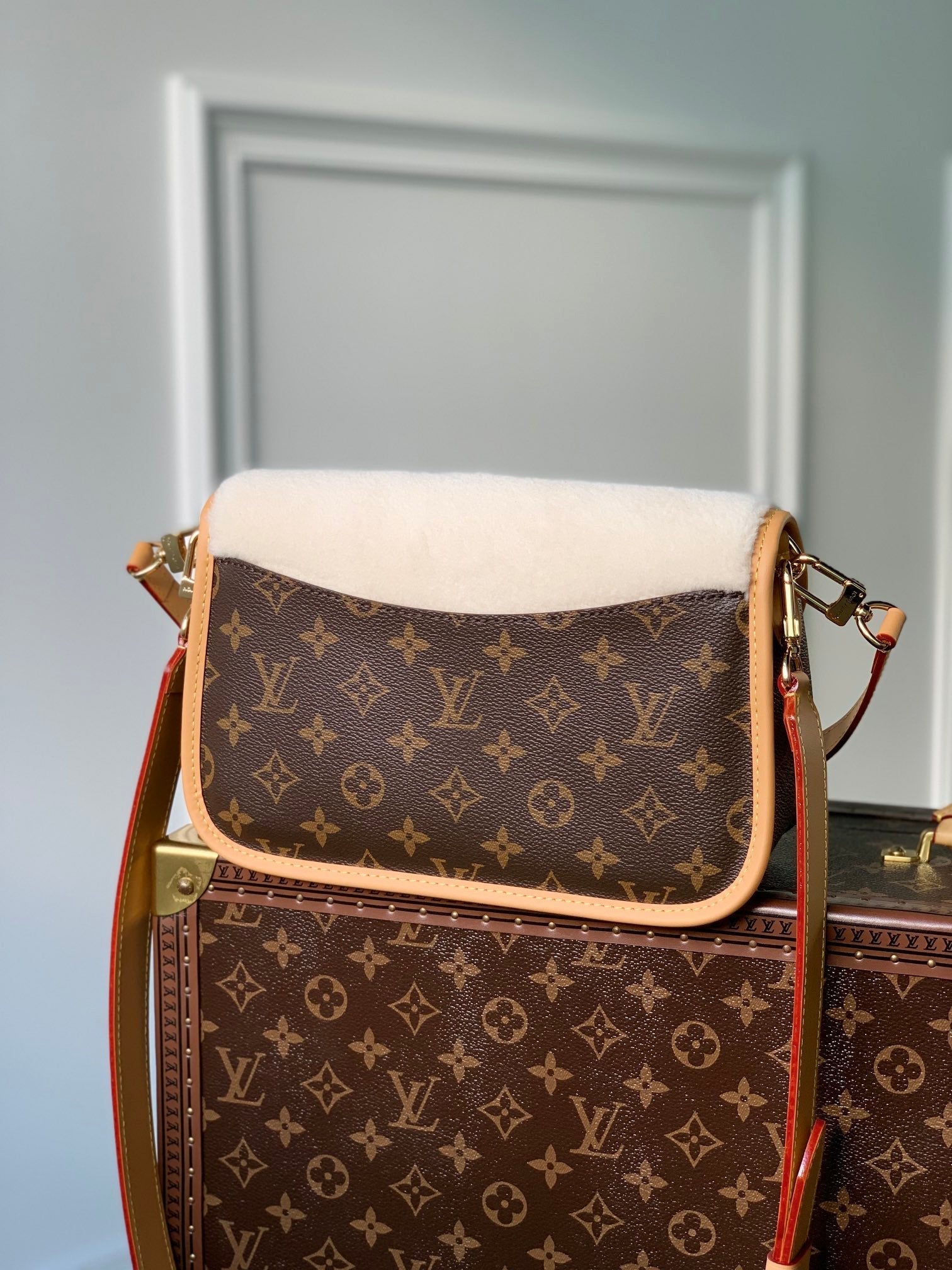 diane 24 brown monogram canvas white fleece