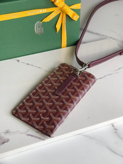 MONTMARTRE GM CASE 18 IN WINE RED GOYARDINE CANVAS