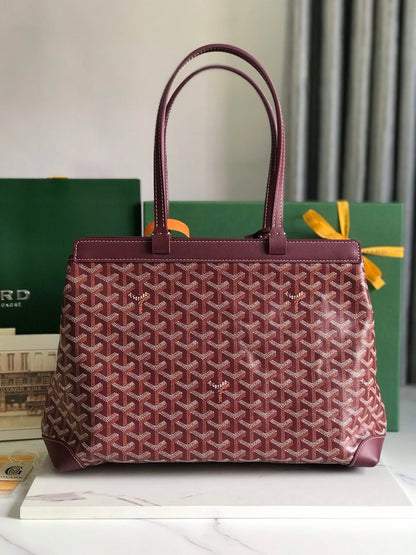 BELLECHASSE BIAUDE PM BAG 36 IN WINE RED GOYARDINE CANVAS AND CALFSKIN TRIM