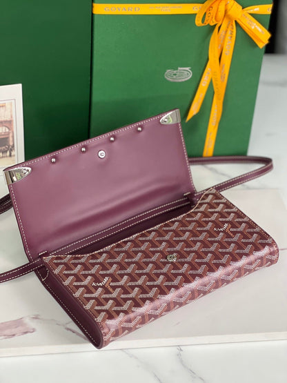 MONTE-CARLO PM CLUTCH 25 IN WINE RED GOYARDINE CANVAS