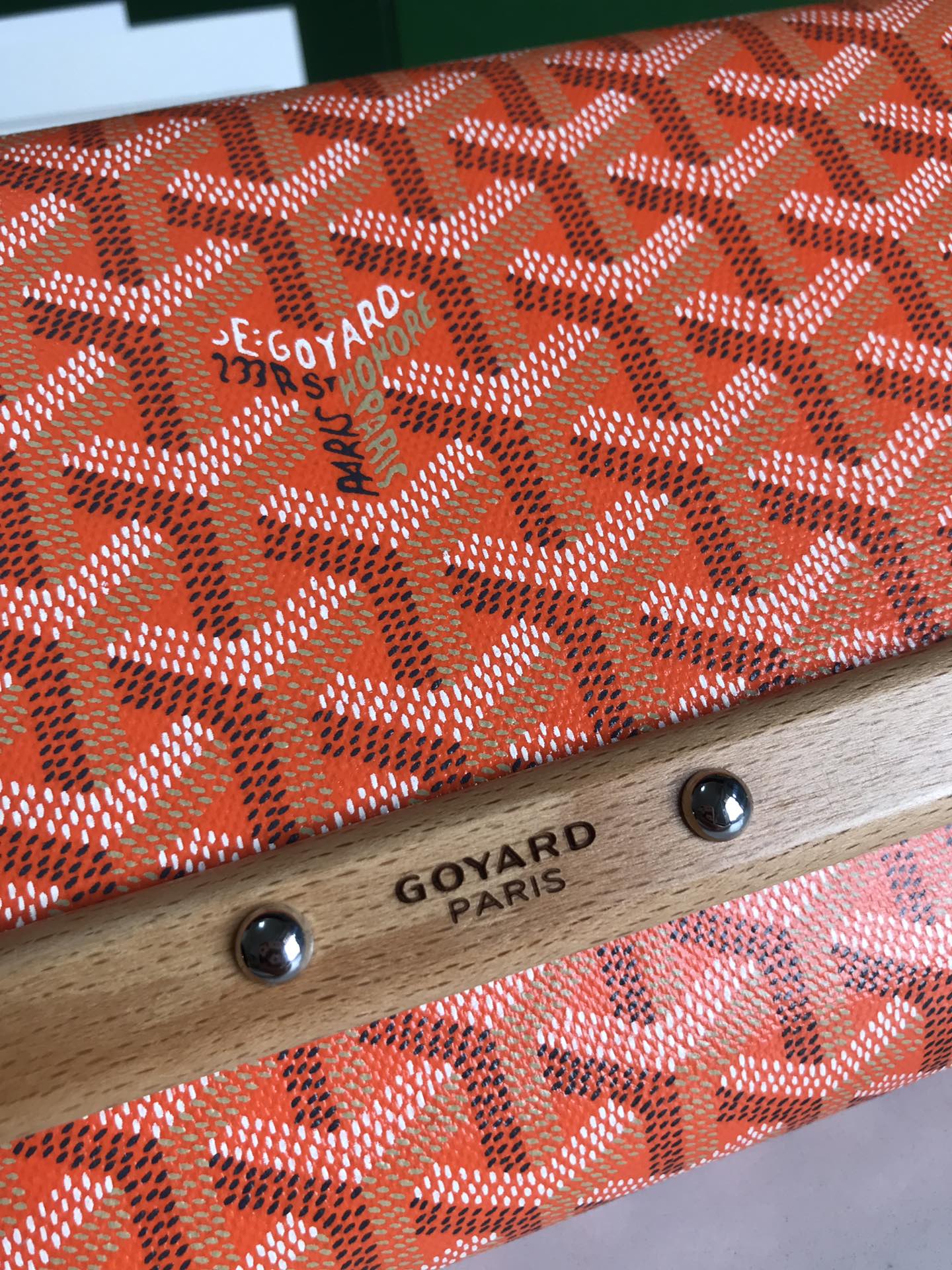 MONTE-CARLO PM CLUTCH 25 IN ORANGE GOYARDINE CANVAS