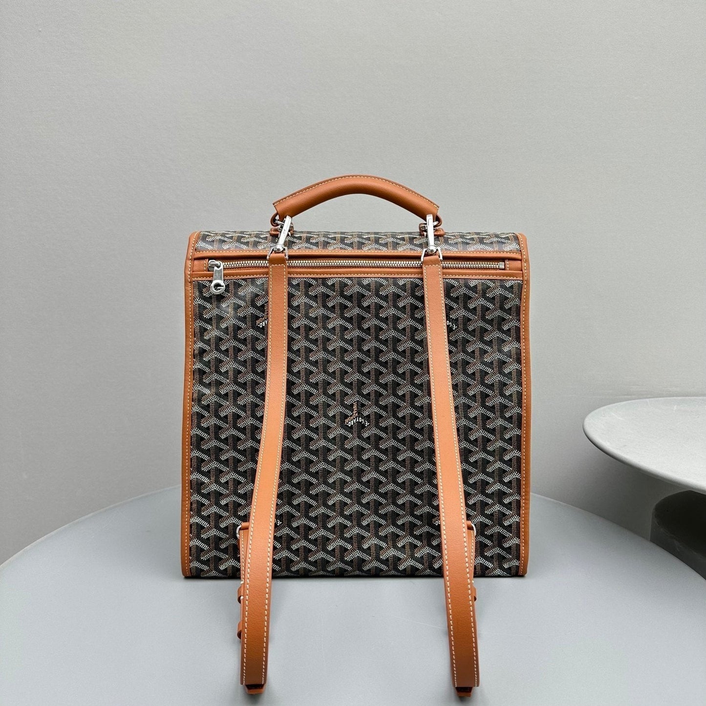 LEGER BACKPACK 37 IN BLACK GOYARDINE CANVAS WITH TAN CALFSKIN TRIM