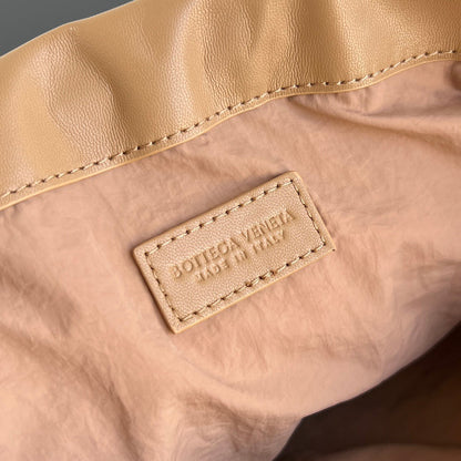 Bottega Veneta 2025 Dustbag Clutch Bag Pale Brown Calfskin