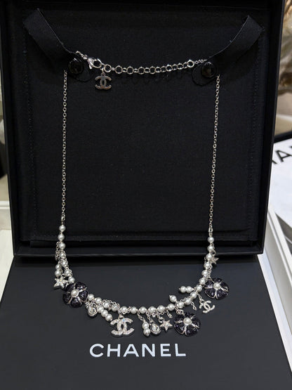 Chanel 2026 Silver Double C Black Flower Pearl Tassel Necklace