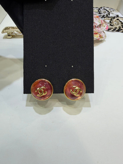 Chanel Gripoix Earrings With Gold CC Logo And Red Glass Stones