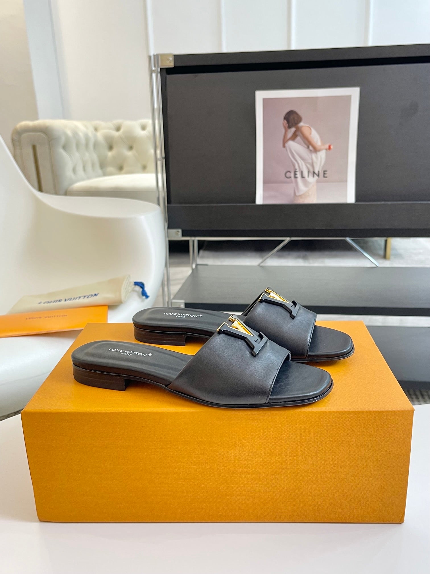 lv capri flat mule black calfskin