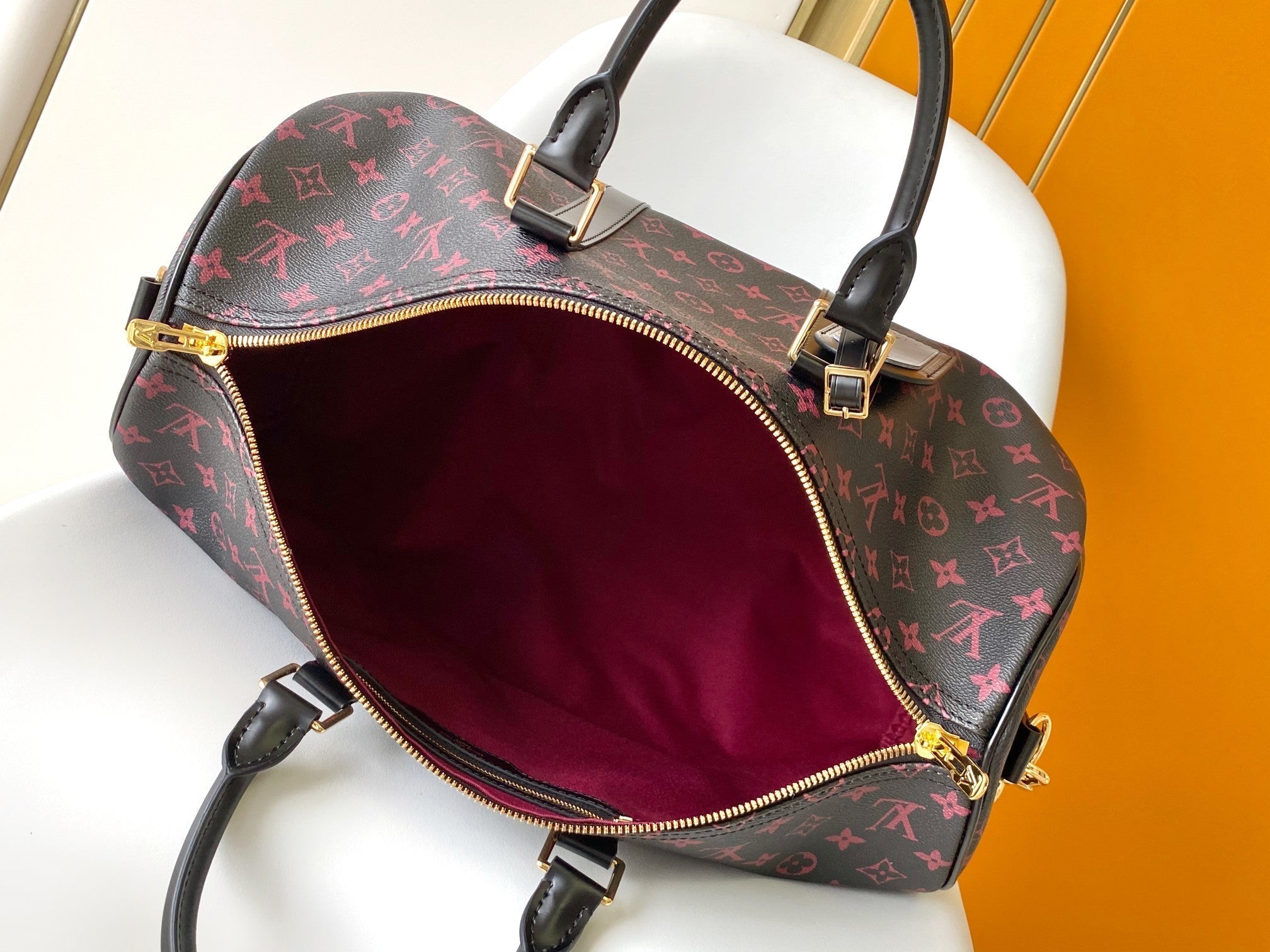 KEEPALL BANDOULIÈRE 45 IN BLACK MONOGRAM TOMETTE CANVAS