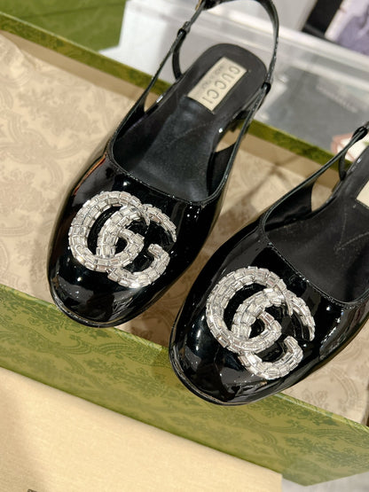 METALIC SLINGBACK FLATS IN BLACK CALFSKIN
