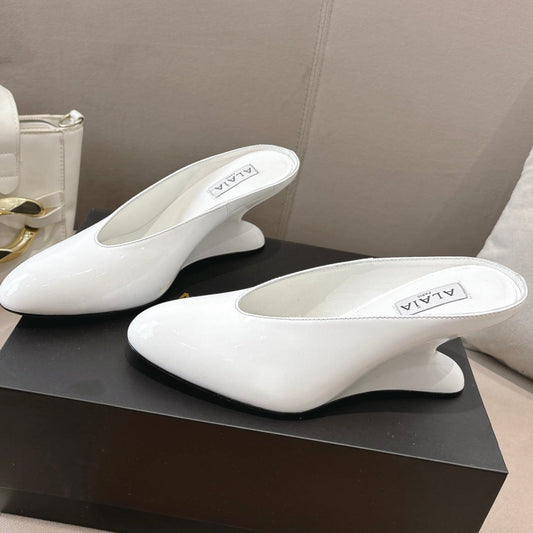 Alaia 25 Curve Wedge Mules White Lambskin 293554