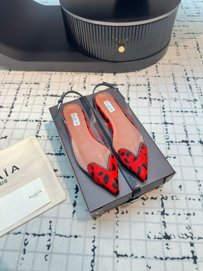 ALAIA FLAT SLINGBACK IN CHERRY RED MIX BLACK PATENT CALFSKIN AND FILM
