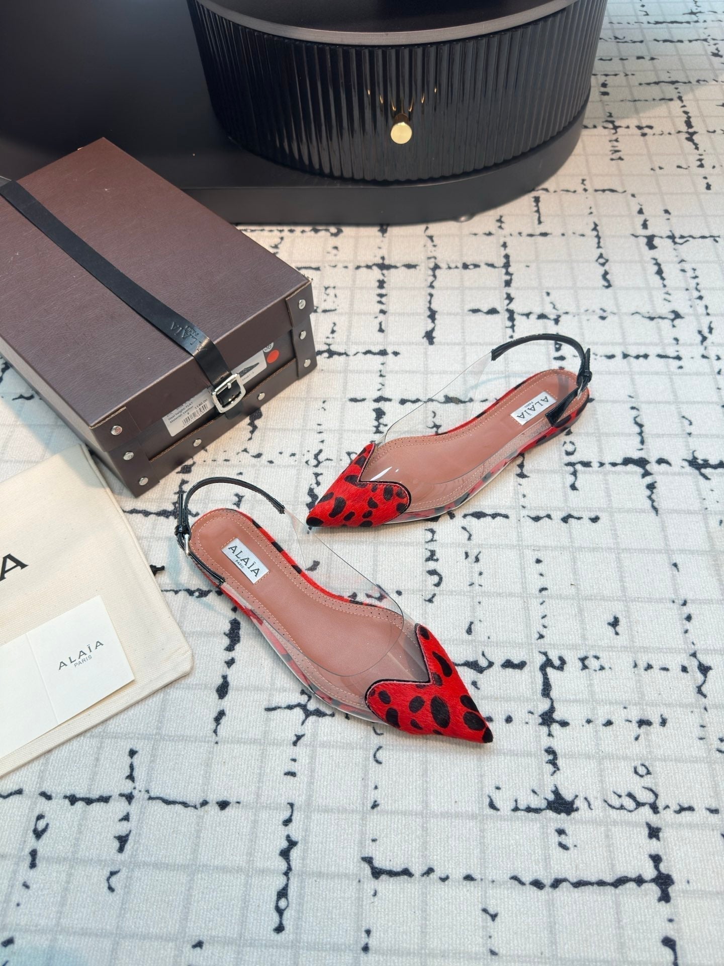 ALAIA FLAT SLINGBACK IN CHERRY RED MIX BLACK PATENT CALFSKIN AND FILM