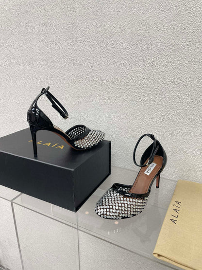 ALAIA HIGH FISHNET PUMPS IN BLACK MESH WITH WHITE RHINSTONES