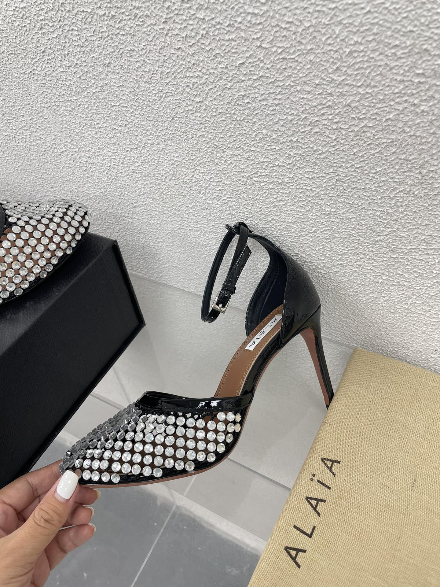 ALAIA HIGH FISHNET PUMPS IN BLACK MESH WITH WHITE RHINSTONES