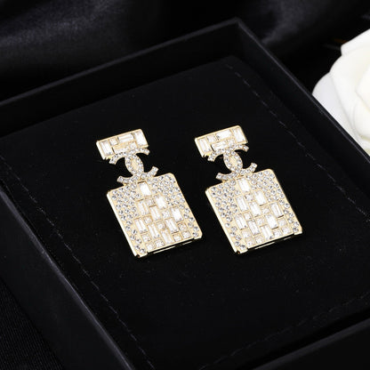 CC Perfume Bottle Gold Diamond Earrings