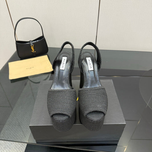 ALAIA platform sandal black sheepskin 389631