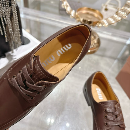 Miu Distressed Loafers  Brown Cowhide 592058